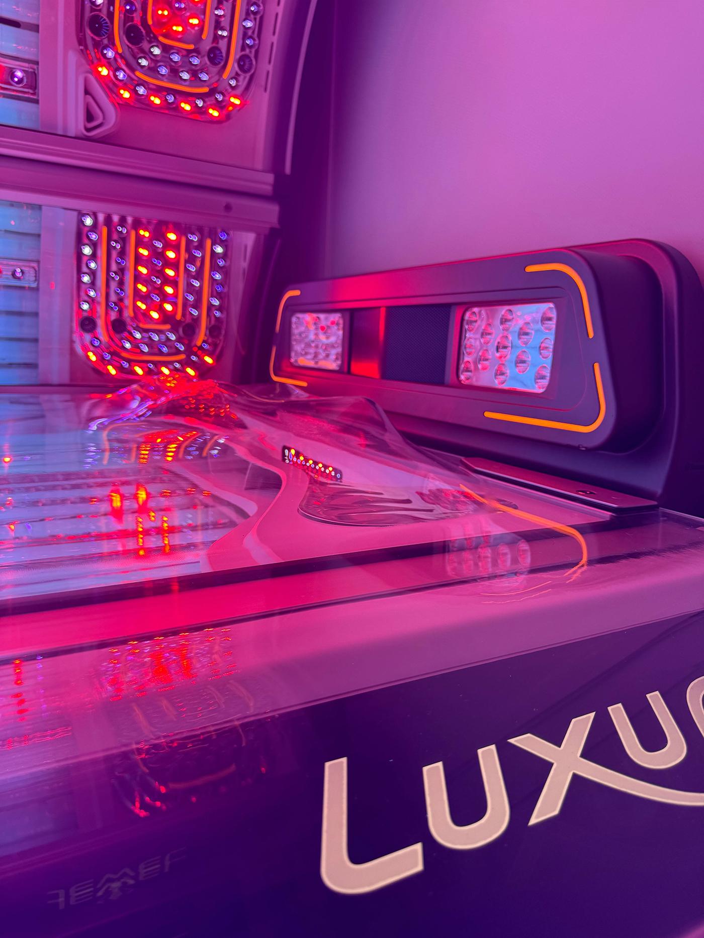 What is a solarium - Luxura sunbed solarium with red LED lights and facial tanning unit at The Tanning Shop UK