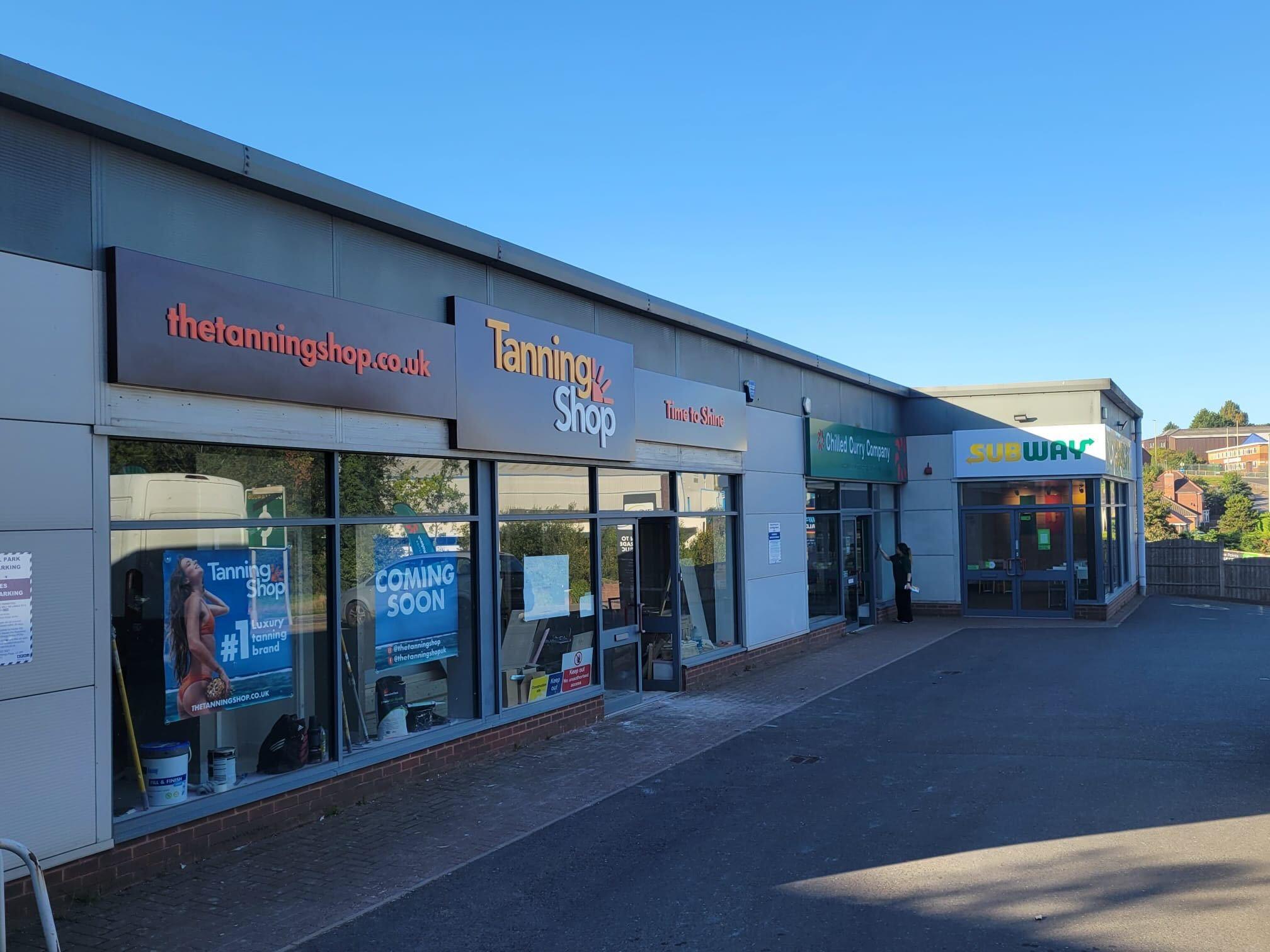 The Tanning Shop UK new store coming soon exterior shopfront with thetanningshop.co.uk signage