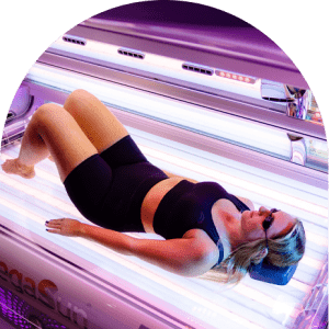 Person relaxing inside tanning bed