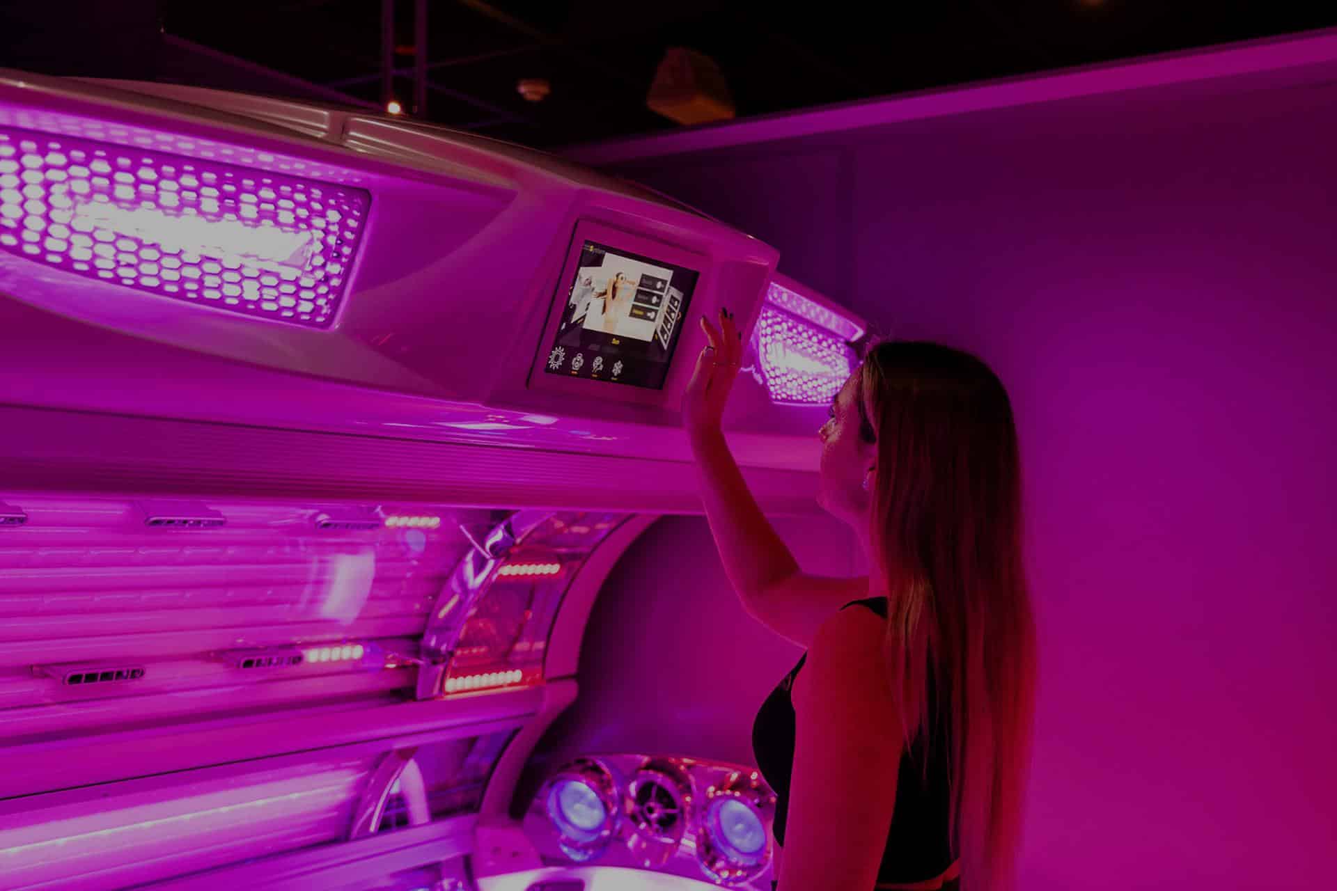 Interior of modern red light therapy tanning bed