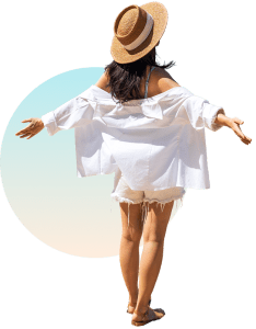 Woman in white dress enjoying sun and wellness