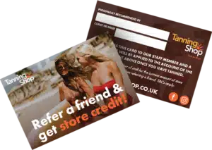 Front and back mockup of The Tanning Shop Refer a Friend card showing a tanned woman with text Refer a friend and get store credit