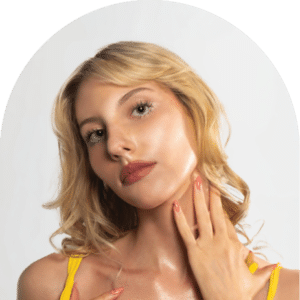 Customer with firm, healthy, radiant skin following a WellFit Lift full-body skincare treatment.