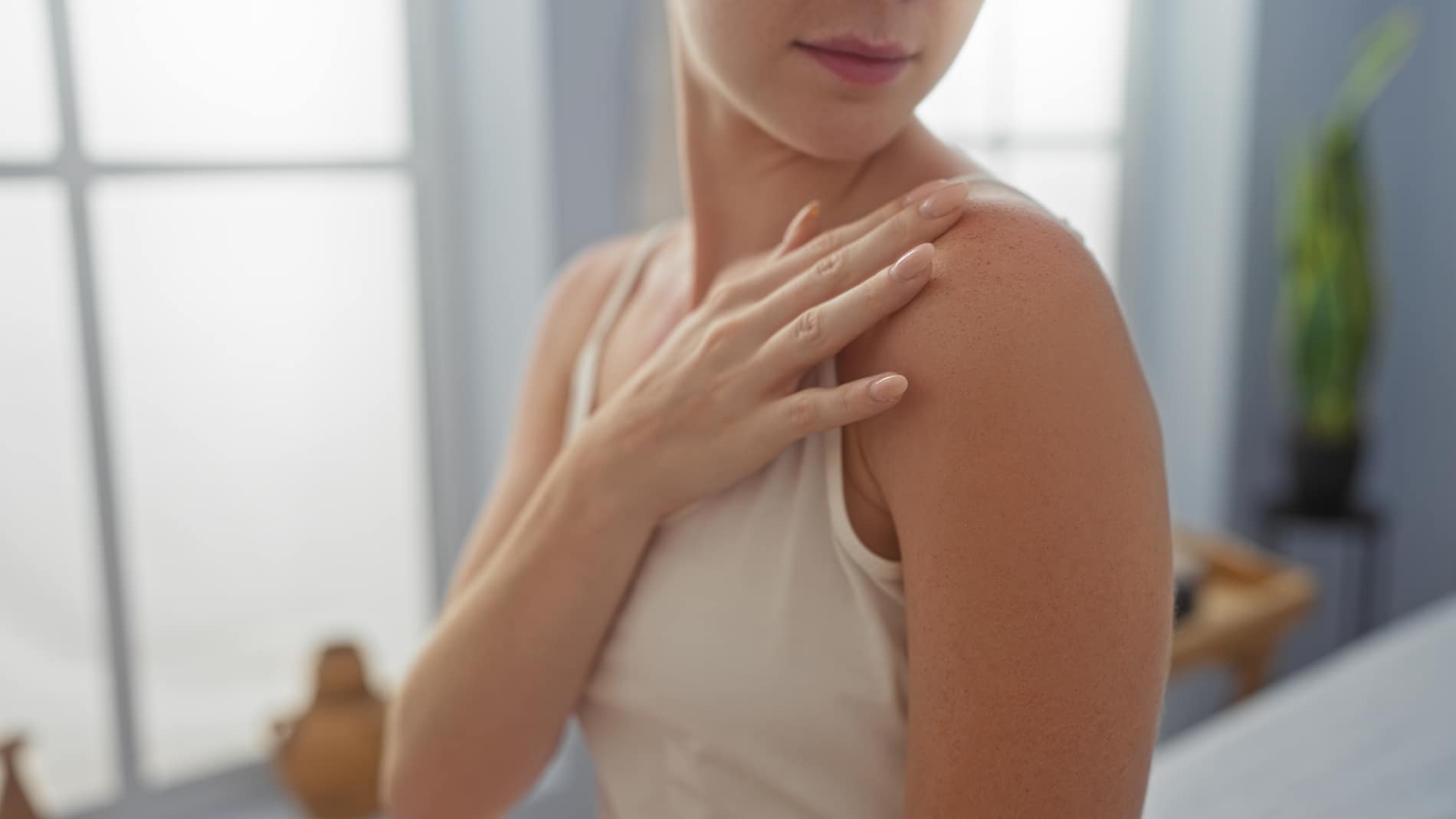 Healthy, even-toned skin after a WellFit full-body skin treatment at The Tanning Shop.